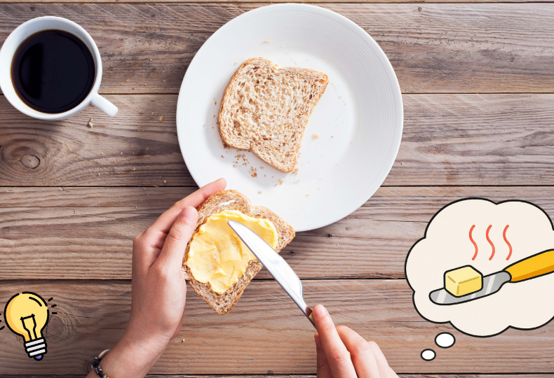 An inventor in a kitchen having a lightbulb moment while buttering toast, imagining a self-warming butter knife—representing the spark of innovation and the need for smart validation tools like InventaIQ.